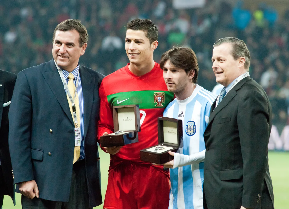 Lionel Messi and Cristiano Ronaldo facing each other on the pitch